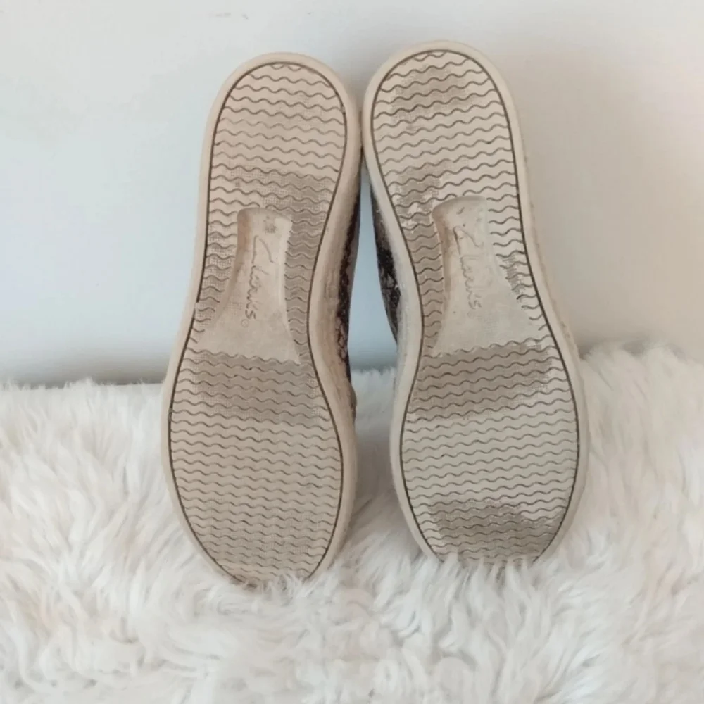 Clarks size 7 animal print slip on espadrilles. Comfort shoes.